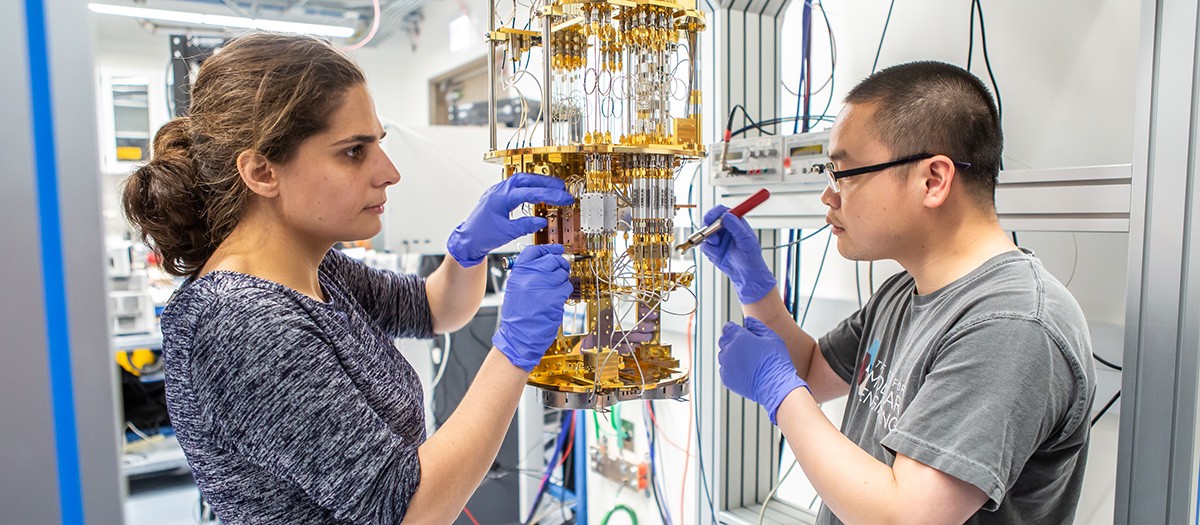 Students working on quantum computer in Cleland Lab